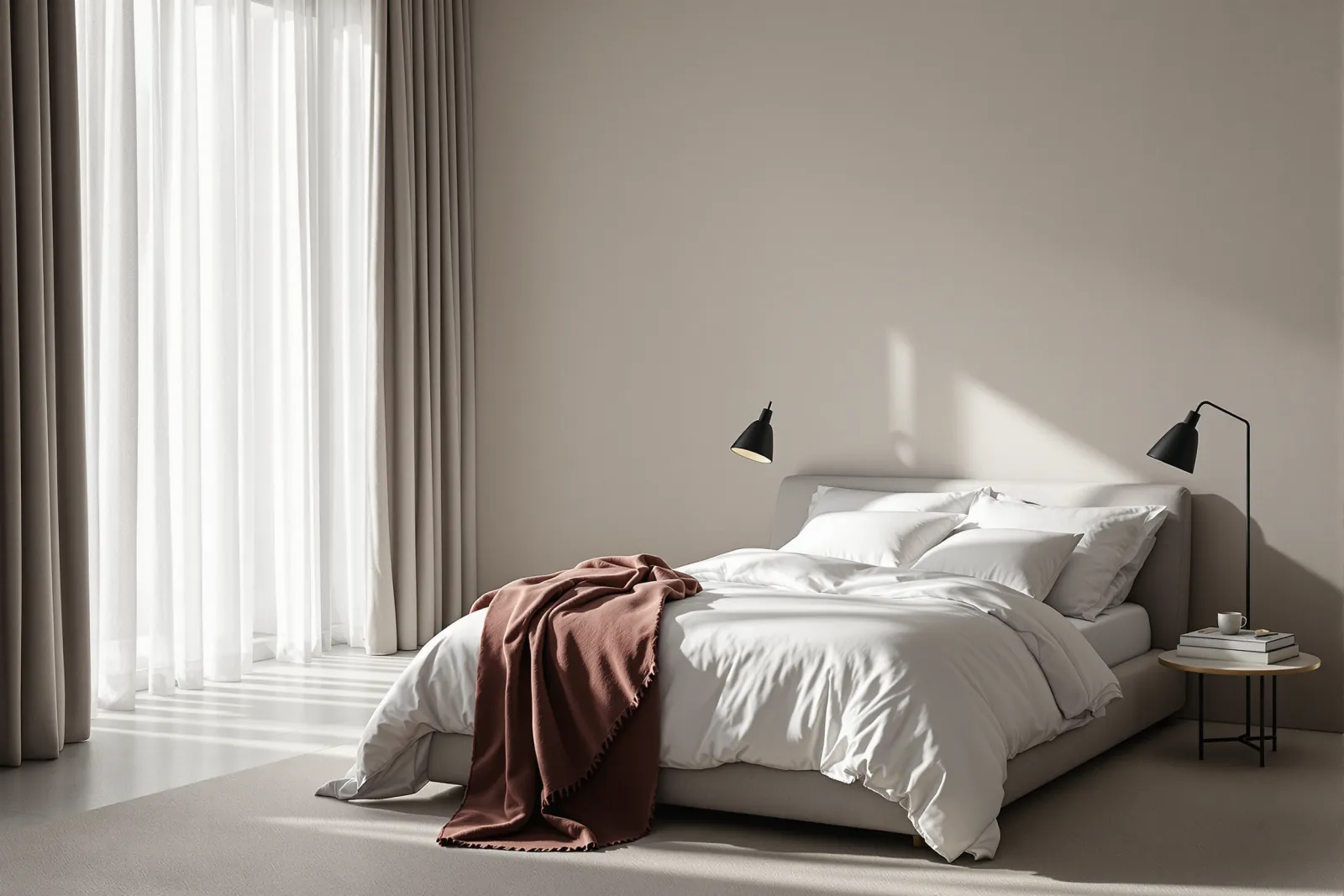 A calm principal bedroom with chalk and ash walls, slim black reading lamps, crisp white linen and a single muted clay throw.